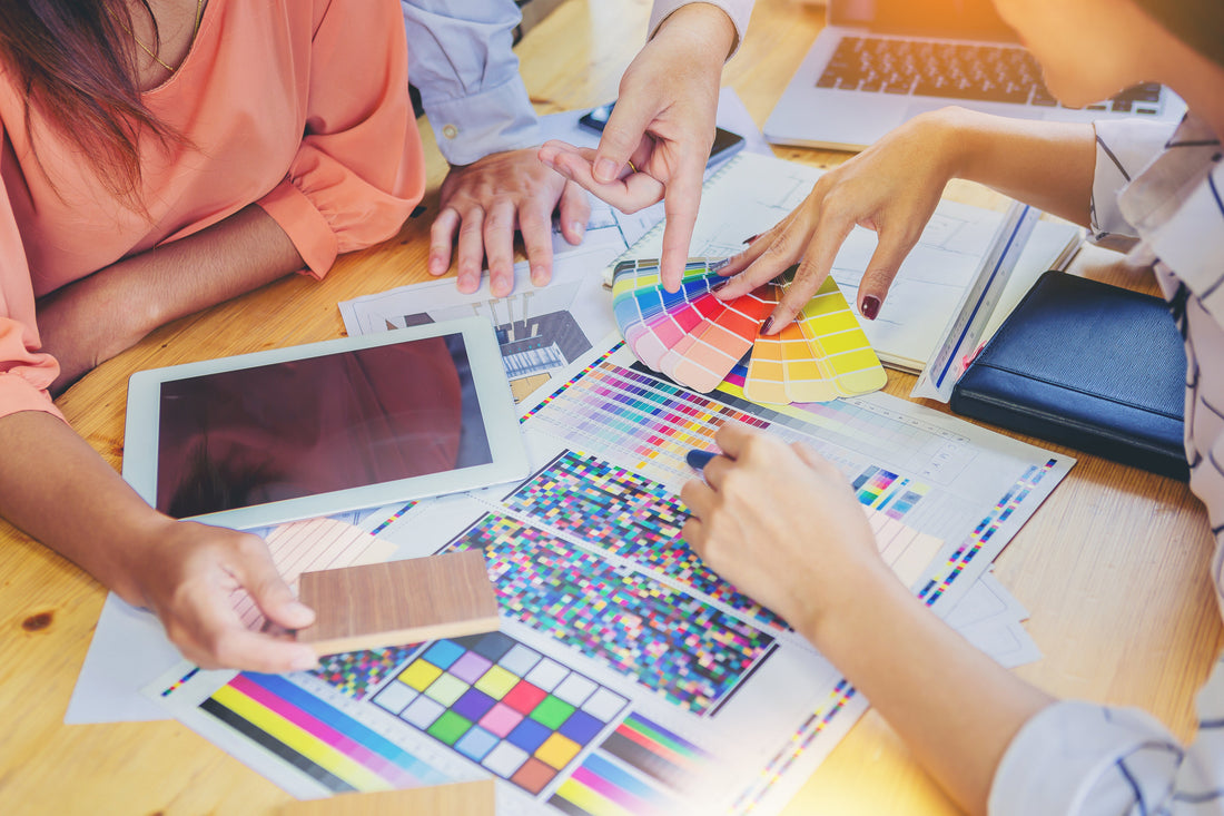 Can you explain the hourly charges for designers?